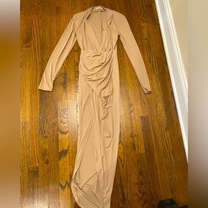 Long sleeved elegant plunge neckline and high slit dress